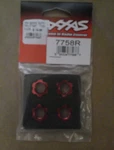 Traxxas 74758R Wheel Nuts, Splined (red-anodized) New. Price: $13.99.