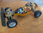 Team Associated Vintage RC10 Gold Remote Control Racing Buggy For Parts Used. Price: $239.99.