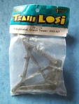 Vintage Team Losi Rear Bulkhead Shock Tower Xxx-nt LOSA2104 Nip New. Price: $11.64.