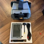Spektrum SPMVM430C 4.3 Inch Fpv Video Monitor With Headset Open. Price: $99.00.