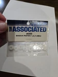 Team Associated 6465 Molded Shock Pistons New. Price: $12.00.