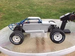 Custom Traxxas Rustler Short Course Buggy Used. Price: $200.00.