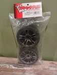 Traxxas Part #6477: Rear Black Chrome Wheels & Belted S1 Slick Tires (2) New. Price: $35.00.