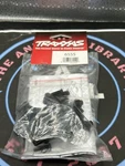 Traxxas. 6555. Mount, Telemetry Expander Used. Price: $8.00.