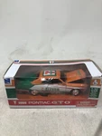 New Ray 1:32 Scale 1966 Pontiac Gto Car, 7-ELEVEN Sponsor. Price: $21.99.