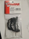 Traxxas Mount Steering Arm/ Stops New Package TRA5343X. Price: $6.99.