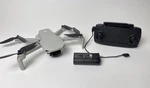 Dji Mavic Mini Camera Drone Aircraft With Battery, Controller, & 32GB Micro Sd Used. Price: $149.99.