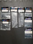 Mugen Seiki MBX5 Parts Lot-anti Rollbar-driveshafts-f/r Arm Supports-bushing Set New. Price: $34.95.